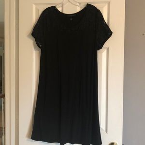 Black swing dress with lace sleeves and bodice